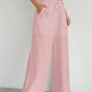 Pantalones sueltos de pierna ancha de color solido para mujer con dobladillo fluido, estilo casual