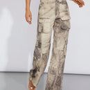 Haute Jeans de pernera ancha con bolsillos cargo y diseno tenido