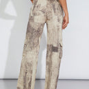 Haute Jeans de pernera ancha con bolsillos cargo y diseno tenido