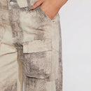 Haute Jeans de pernera ancha con bolsillos cargo y diseno tenido