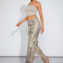 Haute Jeans de pernera ancha con bolsillos cargo y diseno tenido