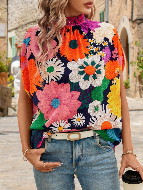 Clasi Blusa estampada de flores Dopamina con mangas murcielago y lazo trasero