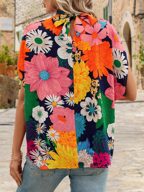Clasi Blusa estampada de flores Dopamina con mangas murcielago y lazo trasero