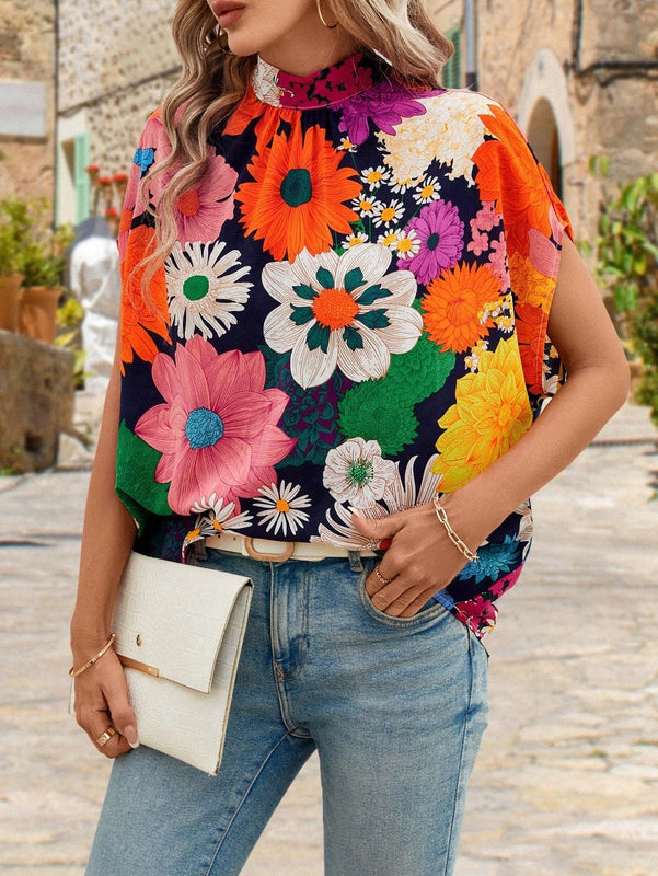 Clasi Blusa estampada de flores Dopamina con mangas murcielago y lazo trasero
