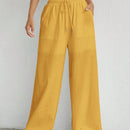 Pantalones sueltos de pierna ancha de color solido para mujer con dobladillo fluido, estilo casual