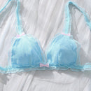 Conjunto de ropa interior de malla transparente para mujer con detalles decorativos de lazo