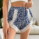 Essnce Mujeres Verano Casual Vacaciones Lindos Pantalones cortos flojos de petalos florales, con encaje unido y mini shorts ligeros antiexposicion