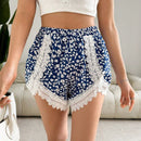Essnce Mujeres Verano Casual Vacaciones Lindos Pantalones cortos flojos de petalos florales, con encaje unido y mini shorts ligeros antiexposicion