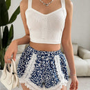 Essnce Mujeres Verano Casual Vacaciones Lindos Pantalones cortos flojos de petalos florales, con encaje unido y mini shorts ligeros antiexposicion