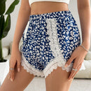Essnce Mujeres Verano Casual Vacaciones Lindos Pantalones cortos flojos de petalos florales, con encaje unido y mini shorts ligeros antiexposicion