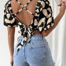 Essnce Camisa de manga abullonada con tenido anudado y estampado en la espalda