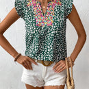 Camisa de mujeres con mangas cortas y volantes estampada para las vacaciones de verano con estilo