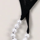 Tanga de mujer con espalda en t, calzoncillos de tiro bajo con cadena de perlas falsas, ropa interior sexy, negro