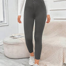 EZwear Pantalones negros ajustados con detalle de botones, bolsillos parchados