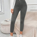 EZwear Pantalones negros ajustados con detalle de botones, bolsillos parchados