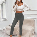 EZwear Pantalones negros ajustados con detalle de botones, bolsillos parchados