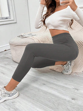 EZwear Pantalones negros ajustados con detalle de botones, bolsillos parchados