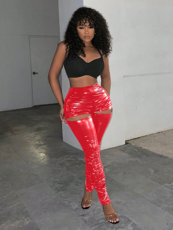 Slayr Leggings sexys y reflectantes con cintura alta, corte estilizado y ajustado con diseno de recortes en la cadera para un look atractivo y moderno.
