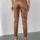 Pantalones conicos casuales con diseno de botones de color liso
