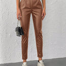 Pantalones conicos casuales con diseno de botones de color liso
