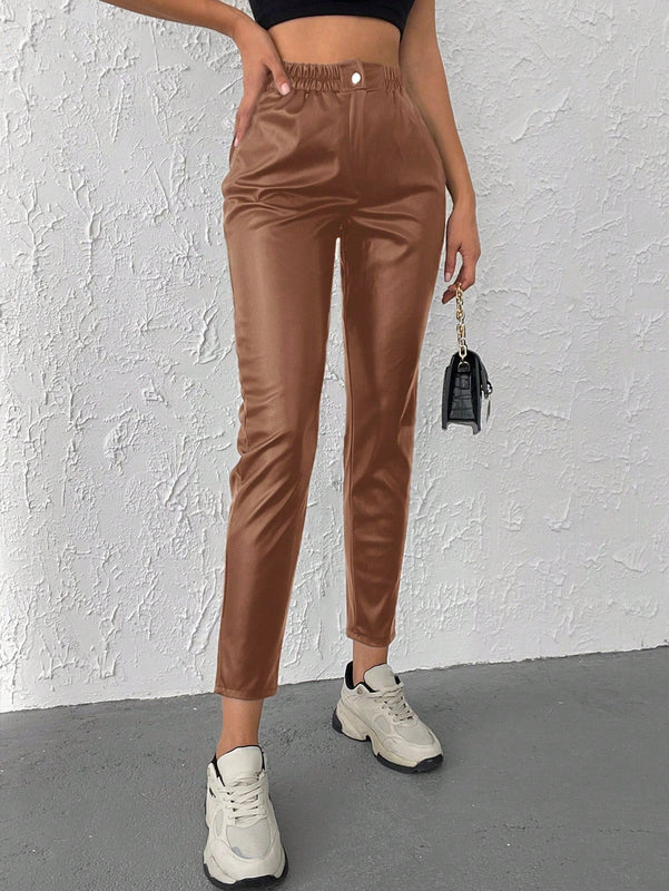 Pantalones conicos casuales con diseno de botones de color liso