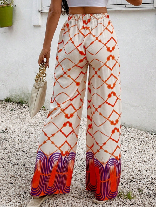 Pantalon de viscosa con estampado tie-dye y estampado colocado, cinturon elastico