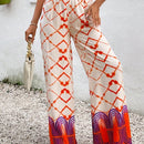 Pantalon de viscosa con estampado tie-dye y estampado colocado, cinturon elastico
