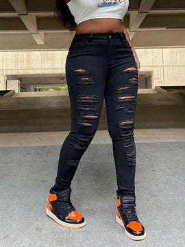 Pantalones ajustados rasgados con piernas estrechas