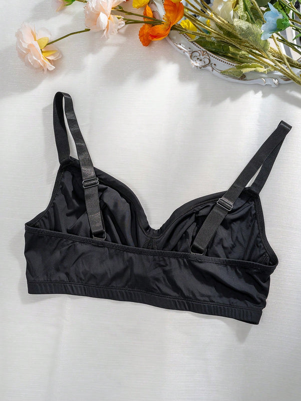 Romantico sujetador negro con tirantes delgados y sin relleno en el pecho