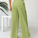 Pantalones sueltos de pierna ancha de color solido para mujer con dobladillo fluido, estilo casual