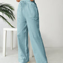 Pantalones sueltos de pierna ancha de color solido para mujer con dobladillo fluido, estilo casual