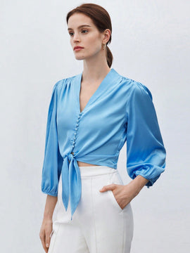 Camisa elegante para el trabajo de mujer en azul con lazo