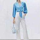 Camisa elegante para el trabajo de mujer en azul con lazo