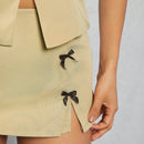 Haute Mini pantalon de falda con abertura lateral y lazo