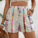 VCAY Shorts informales de cintura elastica para mujer con estampado geometrico y bolsillos laterales cortados al azar