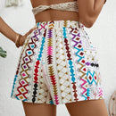 VCAY Shorts informales de cintura elastica para mujer con estampado geometrico y bolsillos laterales cortados al azar