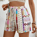 VCAY Shorts informales de cintura elastica para mujer con estampado geometrico y bolsillos laterales cortados al azar