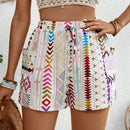VCAY Shorts informales de cintura elastica para mujer con estampado geometrico y bolsillos laterales cortados al azar