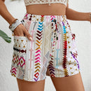 VCAY Shorts informales de cintura elastica para mujer con estampado geometrico y bolsillos laterales cortados al azar