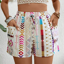 VCAY Shorts informales de cintura elastica para mujer con estampado geometrico y bolsillos laterales cortados al azar