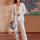 Motf premium pantalones de bolsillo inclinado con estampado floral y costura frontal