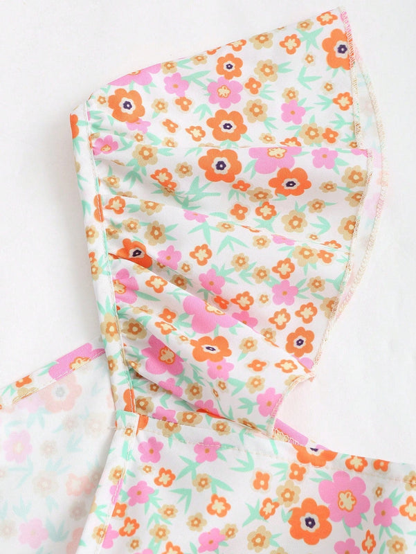 MOD Camisa floral diminuta con nudo delantero y dobladillo con volantes para mujeres en vacaciones