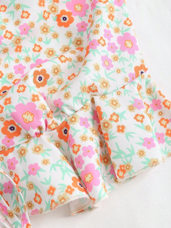 MOD Camisa floral diminuta con nudo delantero y dobladillo con volantes para mujeres en vacaciones