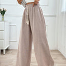 Pantalones boho anchos de vacaciones con bandas elasticas tejidas de rayas y cordon decorativo
