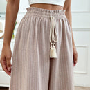 Pantalones boho anchos de vacaciones con bandas elasticas tejidas de rayas y cordon decorativo