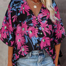Camisa casual impresa de cuello en V para mujeres con mangas de longitud media y botones