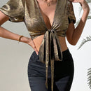 Camisa metalica minimalista para mujer