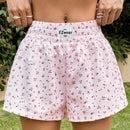 EZwear Shorts de pierna ancha con detalles de parches de letras en estampado floral rosa para salir en verano