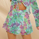 Haute Conjunto de verano con pantalones cortos de estampado floral y dobladillo de lechuga