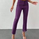 Pantalones unicolor bajo con abertura con cinturon